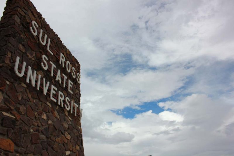 Sul Ross University signage on an overcast day in Alpine